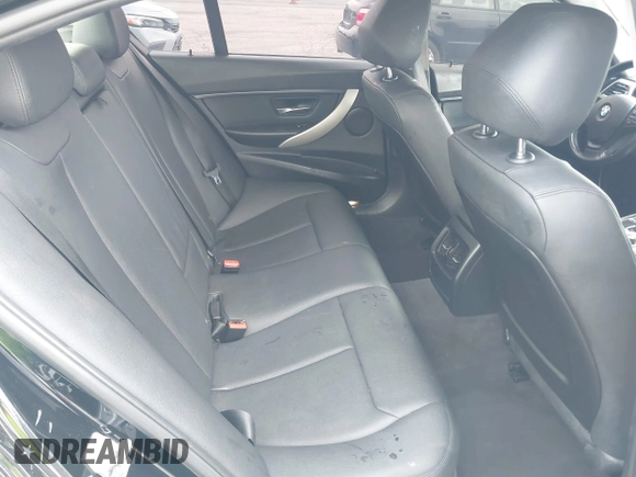 2014 BMW 3 Series 320i with VIN WBA3B1G57ENS80800, listed as a IAAI auction lot 42097683 with 152,924 mi miles. Bid and sale history available at carsss.com. Image 8.