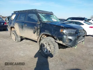 2014 Toyota 4Runner Limited with VIN JTEBU5JR1E5164290, listed as a IAAI auction lot 41413814 with 148,679 mi miles. Bid and sale history available at carsss.com. Image 1.