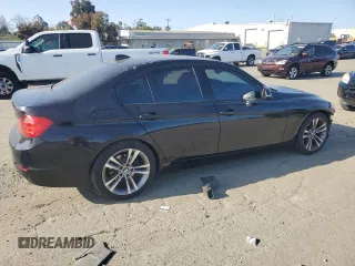 2013 BMW 3 Series 328i with VIN WBA3A5C56DF352000, listed as a Copart auction lot 52206915 with 151,061 mi miles and Salvage title. Bid and sale history available at DreamBid. Image 3.