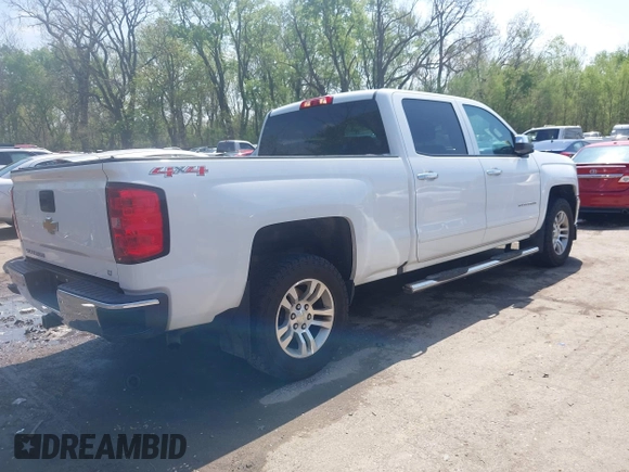 2016 Chevrolet Silverado 1500 LT with VIN 1GCUKREC1GF121209, listed as a IAAI auction lot 42024911 with 152,671 mi miles and . Bid and sale history available at DreamBid. Image 4.