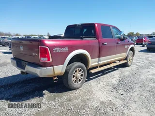 2017 Ram 2500 Laramie z VIN 3C6UR5FL6HG693953, wystawiony jako IAAI lot #41849571 z przebiegiem 99 754 mil mil oraz . Historia ofert i sprzedaży dostępna na DreamBid. Obrazek 4.