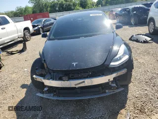 2019 Tesla Model 3 Mid Range z VIN 5YJ3E1EA7KF484369, wystawiony jako Copart lot #51605785 z przebiegiem 101 452 mil mil oraz Nie do naprawy • Non repairable. Historia ofert i sprzedaży dostępna na DreamBid. Obrazek 5.