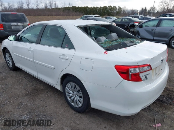2014 Toyota Camry L with VIN 4T4BF1FKXER374901, listed as a IAAI auction lot 41861839 with 130,990 mi miles and . Bid and sale history available at DreamBid. Image 3.