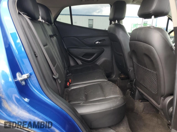 2017 Buick Encore Essence with VIN KL4CJCSB4HB058035, listed as a Copart auction lot 52089365 with 64,194 mi miles and Salvage Title. Bid and sale history available at carsss.com. Image 11.