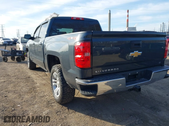 2017 Chevrolet Silverado 1500 LT with VIN 3GCUKREC5HG348435, listed as a IAAI auction lot 41821369 with 140,000 mi miles and . Bid and sale history available at DreamBid. Image 3.