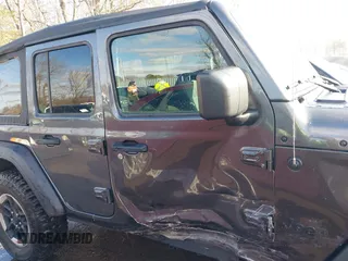2022 Jeep Wrangler Unlimited Sport with VIN 1C4HJXDN1NW240032, listed as a IAAI auction lot 41130845 with 24,745 mi miles and . Bid and sale history available at DreamBid. Image 13.