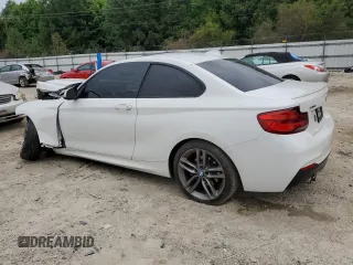 2018 BMW 2 Series 230i xDrive with VIN WBA2J3C54JVA49821, listed as a Copart auction lot 61046555 with 51,167 mi miles and Salvage title. Bid and sale history available at DreamBid. Image 2.