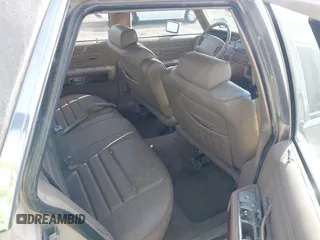 1991 Mercury Grand Marquis z VIN 2MECM75F7MX637786, wystawiony jako IAAI lot #41429297 z przebiegiem 12 512 mil mil oraz . Historia ofert i sprzedaży dostępna na DreamBid. Obrazek 8.