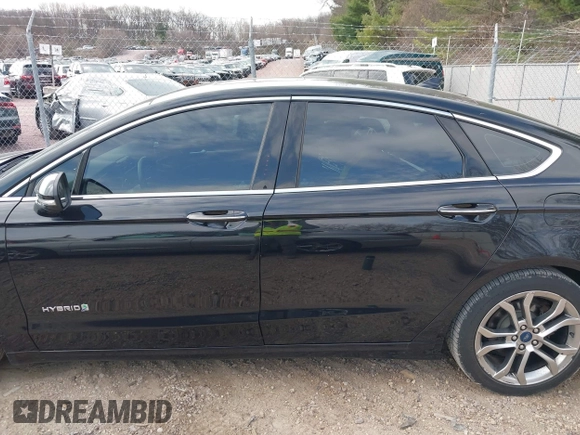 2019 Ford Fusion Hybrid Titanium with VIN 3FA6P0RU4KR144445, listed as a IAAI auction lot 42059840 with 90,617 mi miles. Bid and sale history available at carsss.com. Image 15.