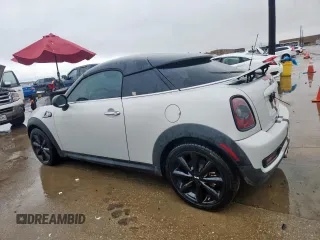 2015 MINI Coupe S z VIN WMWSX3C51FT409464, wystawiony jako Copart lot #60761415 z przebiegiem Nie podano mil oraz Czysty tytuł • Clean title. Historia ofert i sprzedaży dostępna na DreamBid. Obrazek 2.
