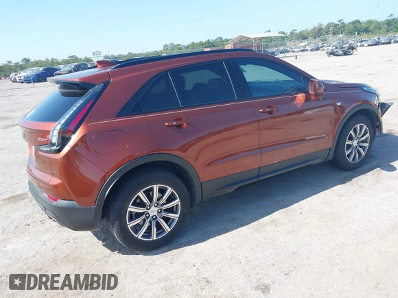 2019 Cadillac XT4 FWD Sport z VIN 1GYFZER4XKF103780, wystawiony jako IAAI lot #42171306 z przebiegiem 99 260 mil mil oraz . Historia ofert i sprzedaży dostępna na DreamBid. Obrazek 4.