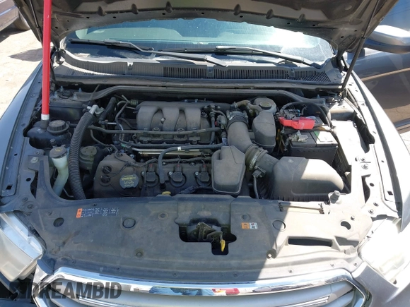 2013 Ford Taurus SEL with VIN 1FAHP2E81DG113242, listed as a IAAI auction lot 41952486 with 169,369 mi miles. Bid and sale history available at carsss.com. Image 10.