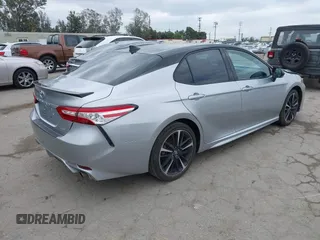 2020 Toyota Camry XSE with VIN 4T1K61AK1LU318098, listed as a IAAI auction lot 42197271 with 64,118 mi miles and . Bid and sale history available at DreamBid. Image 4.