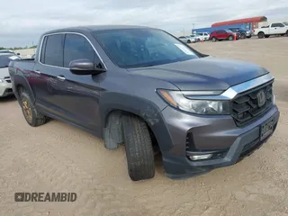 2022 Honda Ridgeline RTL-E z VIN 5FPYK3F73NB019760, wystawiony jako IAAI lot #42622775 z przebiegiem 42 589 mil mil oraz . Historia ofert i sprzedaży dostępna na DreamBid. Obrazek 1.