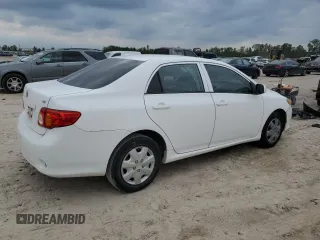 2010 Toyota Corolla with VIN 1NXBU4EE7AZ256666, listed as a Copart auction lot 79097074 with 65,537 mi miles and Salvage title. Bid and sale history available at DreamBid. Image 3.