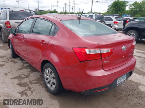 2012 Kia Rio LX with VIN KNADM4A36C6085057, listed as a IAAI auction lot 42111921 with 136,217 mi miles. Bid and sale history available at carsss.com. Image 3.