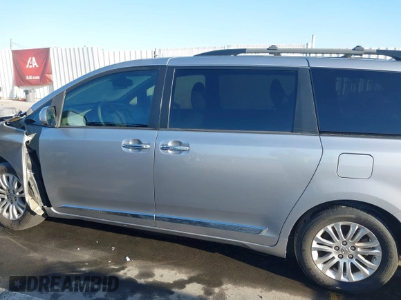 2012 Toyota Sienna XLE AAS with VIN 5TDYK3DC0CS243912, listed as a IAAI auction lot 41758833 with 132,008 mi miles and . Bid and sale history available at DreamBid. Image 14.