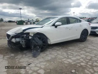 2016 Mazda 6 i Grand Touring с VIN JM1GJ1W57G1431069, выставлен на аукционе Copart как лот 57970285 с пробегом 98 411 миль миль и Списание • Salvage title. История ставок и продаж доступна на DreamBid. Изображение 1.