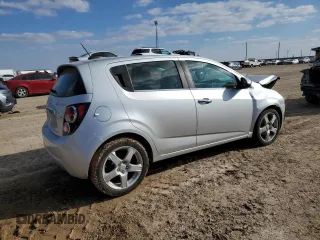 2016 Chevrolet Sonic LTZ z VIN 1G1JE6SB8G4159979, wystawiony jako Copart lot #83398084 z przebiegiem 120 767 mil mil oraz Szkoda całkowita • Salvage title. Historia ofert i sprzedaży dostępna na DreamBid. Obrazek 3.