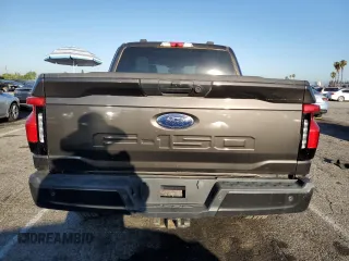 2023 Ford F-150 Lightning Pro with VIN 1FTVW1EL7PWG11261, listed as a Copart auction lot 64088925 with 3,288 mi miles and Salvage title. Bid and sale history available at DreamBid. Image 6.