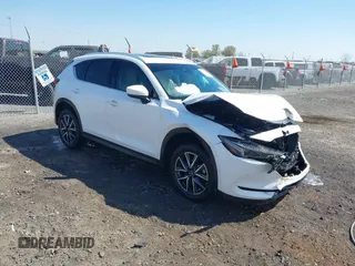 2018 Mazda CX-5 Grand Touring with VIN JM3KFBDM0J0404635, listed as a IAAI auction lot 41883068 with 71,178 mi miles. Bid and sale history available at carsss.com. Image 1.