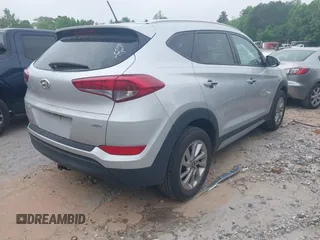 2017 Hyundai Tucson SE with VIN KM8J3CA44HU585714, listed as a IAAI auction lot 42097980 with 96,483 mi miles. Bid and sale history available at carsss.com. Image 4.