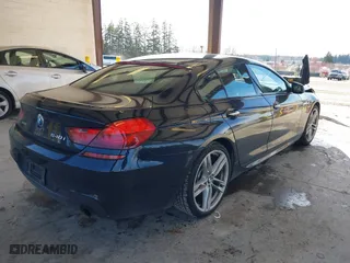 2014 BMW 6 Series 640i xDrive with VIN WBA6B8C5XED452416, listed as a IAAI auction lot 41851885 with 111,445 mi miles. Bid and sale history available at carsss.com. Image 4.