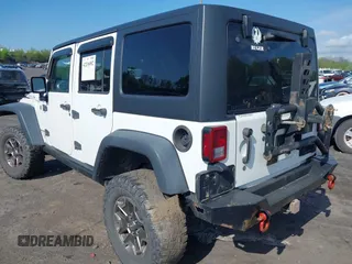 2014 Jeep Wrangler Unlimited Rubicon X with VIN 1C4BJWFG6EL240849, listed as a IAAI auction lot 42216082 with 118,912 mi miles and . Bid and sale history available at DreamBid. Image 3.