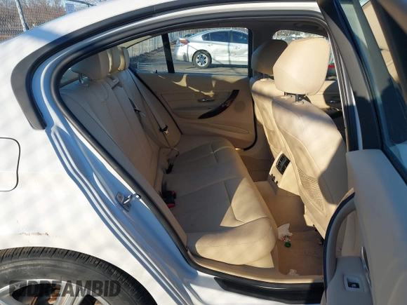 2014 BMW 3 Series 328i xDrive with VIN WBA3B5G58ENS08415, listed as a IAAI auction lot 41642668 with 51,563 mi miles and . Bid and sale history available at DreamBid. Image 8.