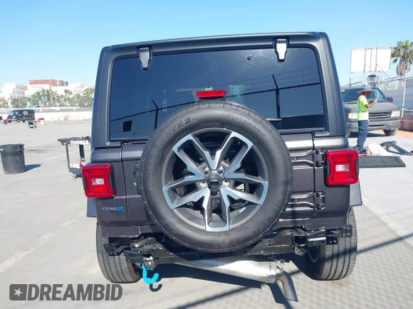 2024 Jeep Wrangler Sport S with VIN 1C4RJXN61RW192386, listed as a IAAI auction lot 42001810 with 7,426 mi miles and . Bid and sale history available at DreamBid. Image 16.