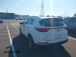 2017 Kia Sportage EX with VIN KNDPN3AC9H7077804, listed as a IAAI auction lot 42632194 with 134,027 mi miles and . Bid and sale history available at DreamBid. Image 3.