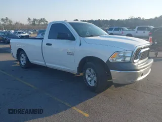 2018 Ram 1500 Tradesman with VIN 3C6JR6DG6JG157833, listed as a IAAI auction lot 41794118 with 205,186 mi miles and . Bid and sale history available at DreamBid. Image 1.