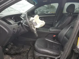 2016 Ford Taurus SEL z VIN 1FAHP2E83GG148885, wystawiony jako Copart lot #59760575 z przebiegiem 135 579 mil mil oraz Szkoda całkowita • Salvage title. Historia ofert i sprzedaży dostępna na DreamBid. Obrazek 7.