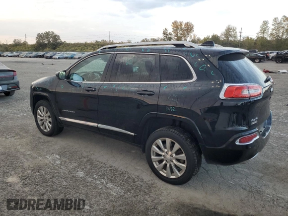 2018 Jeep Cherokee Overland with VIN 1C4PJMJX8JD562138, listed as a Copart auction lot 77249404 with 119,865 mi miles and Salvage Title. Bid and sale history available at carsss.com. Image 2.