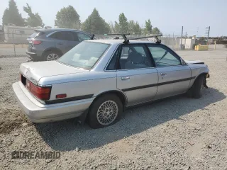 1989 Toyota Camry LE ECT z VIN JT2SV22E3K3346603, wystawiony jako Copart lot #62570044 z przebiegiem 213 105 mil mil oraz Szkoda całkowita • Salvage title. Historia ofert i sprzedaży dostępna na DreamBid. Obrazek 3.