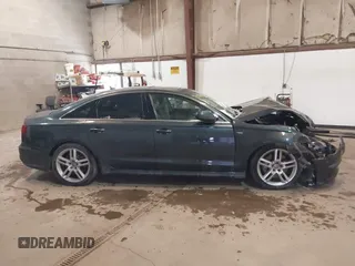 2016 Audi A6 2.0T Premium Plus with VIN WAUGFAFC8GN088505, listed as a IAAI auction lot 41569043 with 98,528 mi miles. Bid and sale history available at carsss.com. Image 14.