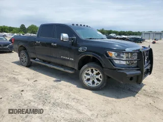 2017 Nissan Titan Platinum Reserve z VIN 1N6BA1F45HN552823, wystawiony jako Copart lot #58463895 z przebiegiem 157 375 mil mil oraz Tytuł czysty. Historia ofert i sprzedaży dostępna na DreamBid. Obrazek 4.