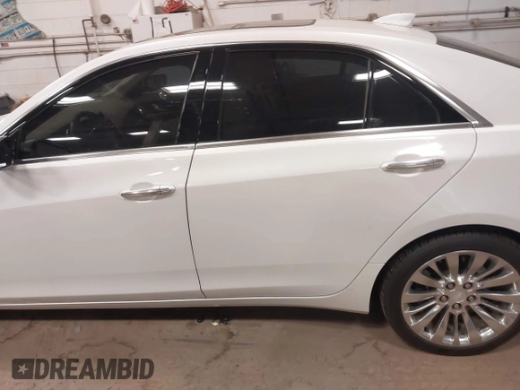 2016 Cadillac CTS Luxury Collection AWD with VIN 1G6AX5SS6G0125285, listed as a IAAI auction lot 42137355 with 110,299 mi miles and . Bid and sale history available at DreamBid. Image 14.