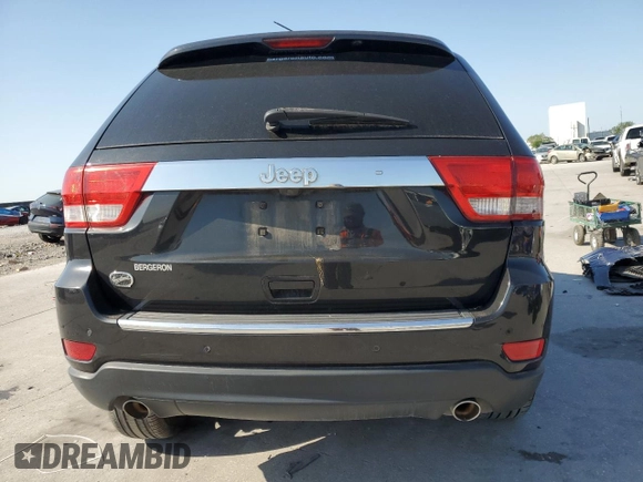 2013 Jeep Grand Cherokee Overland with VIN 1C4RJECT8DC556536, listed as a Copart auction lot 52758795 with 67,123 mi miles and Salvage Title. Bid and sale history available at carsss.com. Image 6.