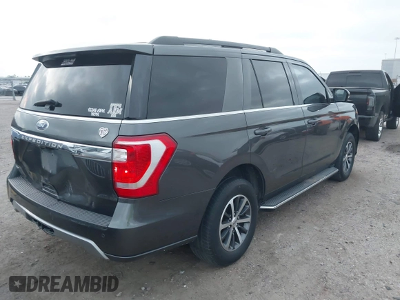 2019 Ford Expedition XLT with VIN 1FMJU1HT7KEA11849, listed as a IAAI auction lot 41727959 with 133,975 mi miles. Bid and sale history available at carsss.com. Image 4.