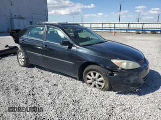 2002 Toyota Camry XLE z VIN 4T1BF30K12U020467, wystawiony jako Copart lot #54628995 z przebiegiem 222 898 mil mil oraz Szkoda całkowita • Salvage title. Historia ofert i sprzedaży dostępna na DreamBid. Obrazek 4.