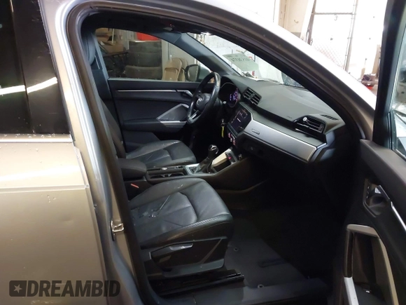 2019 Audi Q3 Premium with VIN WA1AECF33K1077204, listed as a IAAI auction lot 41538374 with 101,264 mi miles and . Bid and sale history available at DreamBid. Image 5.