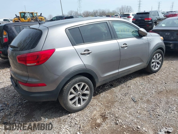 2015 Kia Sportage LX with VIN KNDPBCAC6F7790469, listed as a IAAI auction lot 41942732 with 74,612 mi miles and . Bid and sale history available at DreamBid. Image 4.