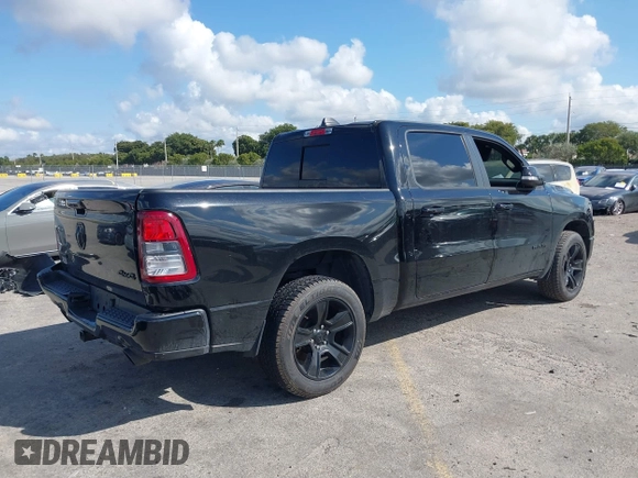 2022 Ram 1500 Big Horn with VIN 1C6SRFFT1NN220669, listed as a IAAI auction lot 41483598 with 1 mi miles. Bid and sale history available at carsss.com. Image 4.