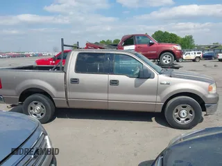 2004 Ford F-150 XLT with VIN 1FTRW12W74KD52290, listed as a IAAI auction lot 42066324 with 252,866 mi miles. Bid and sale history available at carsss.com. Image 13.