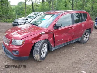 2014 Jeep Compass Sport with VIN 1C4NJDBB8ED799048, listed as a IAAI auction lot 39434584 with 119,507 mi miles. Bid and sale history available at carsss.com. Image 2.