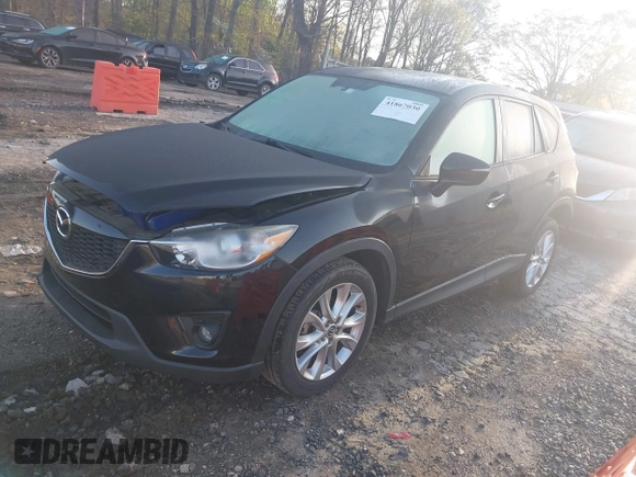 2015 Mazda CX-5 Grand Touring with VIN JM3KE4DY6F0513173, listed as a IAAI auction lot 41867030 with 93,770 mi miles. Bid and sale history available at carsss.com. Image 17.