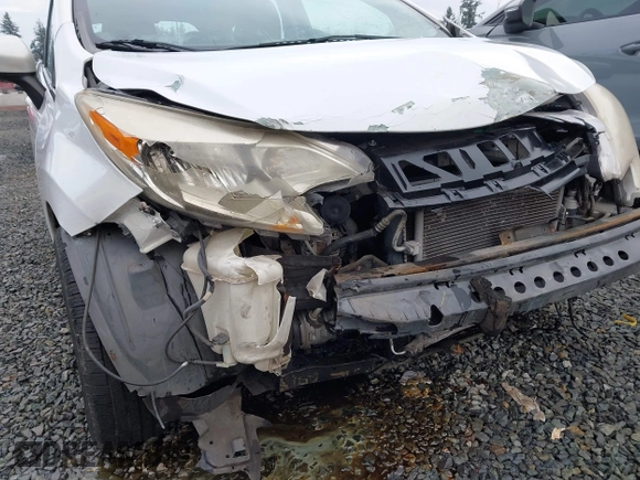 2015 Nissan Note SV with VIN 3N1CE2CP8FL371084, listed as a IAAI auction lot 41030028 with 101,301 mi miles and . Bid and sale history available at DreamBid. Image 6.