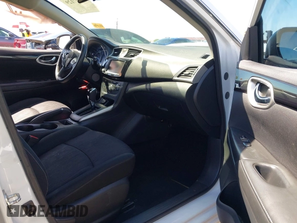 2019 Nissan Sentra S with VIN 3N1AB7AP8KY323629, listed as a IAAI auction lot 42207129 with 77,265 mi miles and . Bid and sale history available at DreamBid. Image 5.