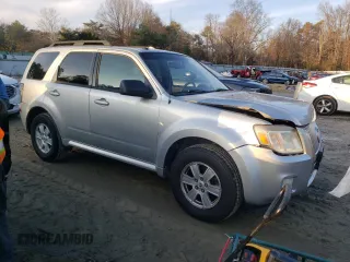 2010 Mercury Mariner z VIN 4M2CN9BG5AKJ16629, wystawiony jako Copart lot #85464894 z przebiegiem 101 587 mil mil oraz Szkoda całkowita • Salvage title. Historia ofert i sprzedaży dostępna na DreamBid. Obrazek 4.